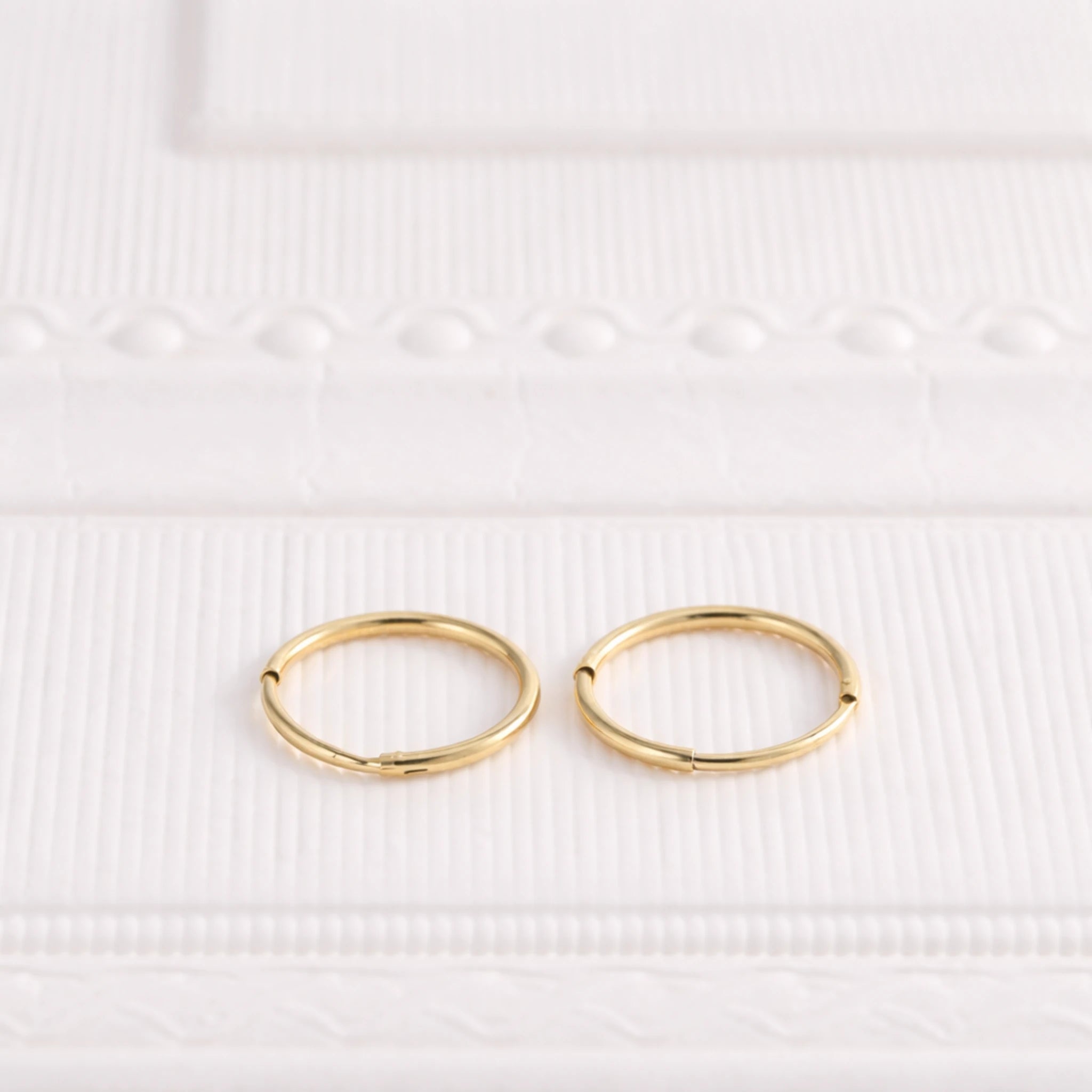 Sterling Silver Tiny Huggie Hoop Earrings