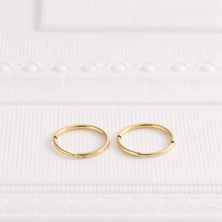 Sterling Silver Tiny Huggie Hoop Earrings