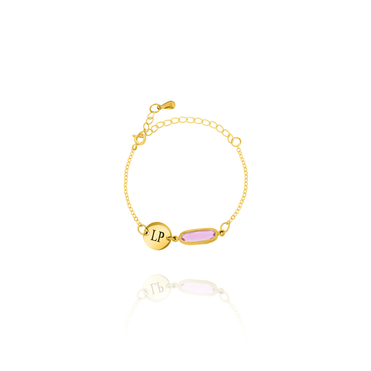 Gold-tone bracelet with engraved LP disc and pale pink elongated rectangular stone on white background