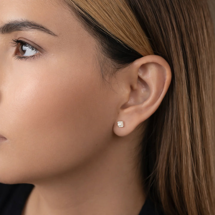 Tiny Freshwater Pearl Stud Earrings in Sterling Silver