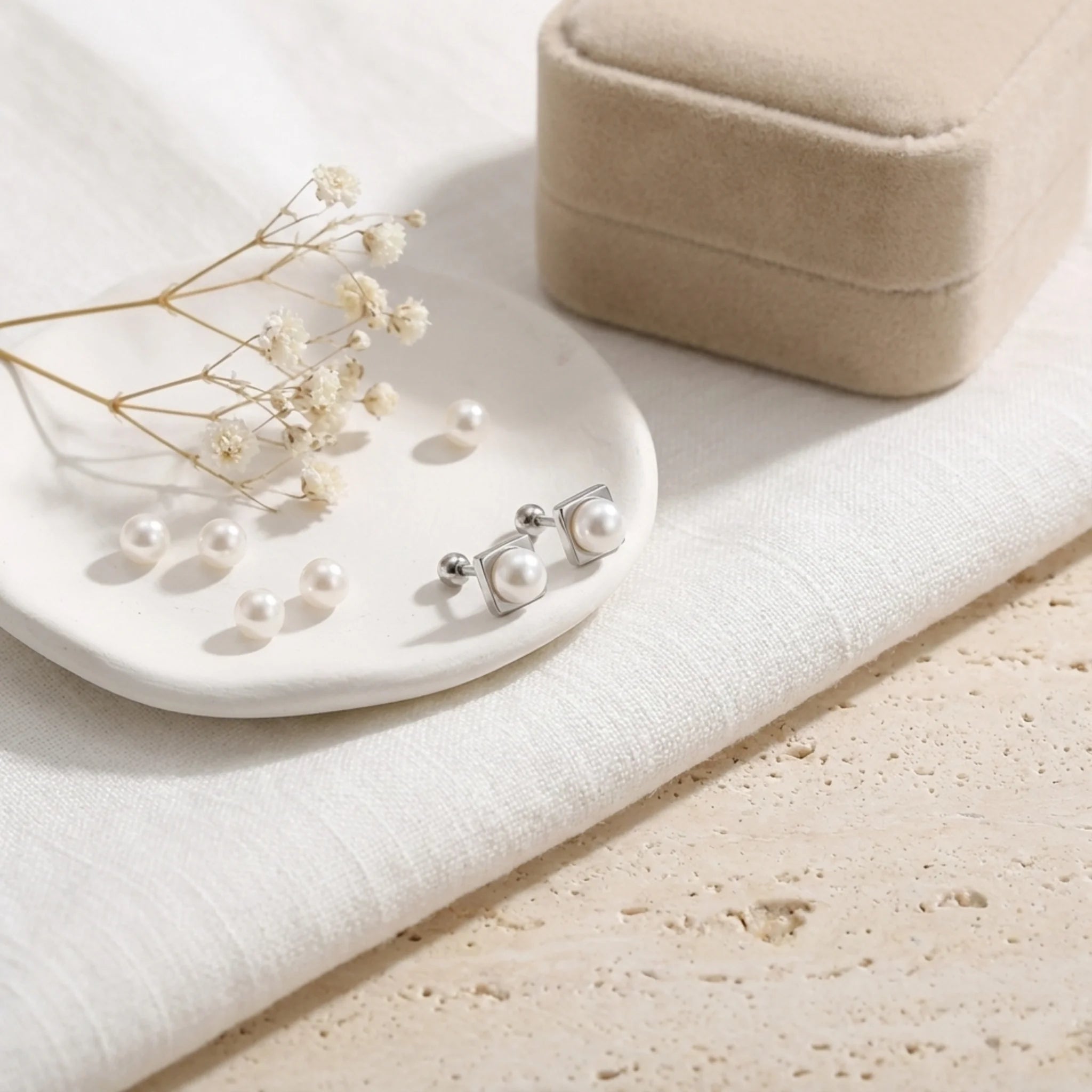 Tiny Freshwater Pearl Stud Earrings in Sterling Silver