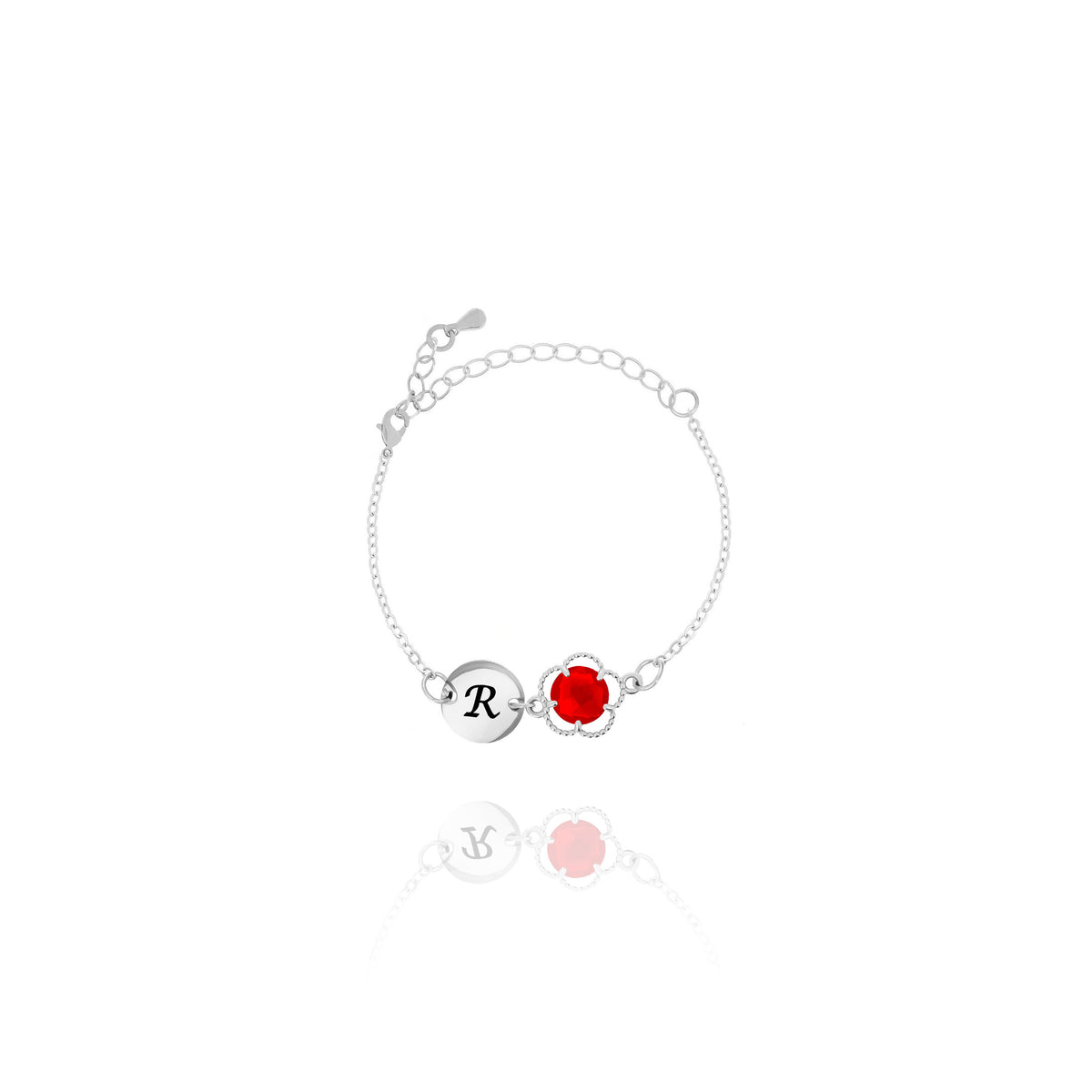 Silver-tone bracelet with engraved R initial disc and red round stone in a beaded frame on white background